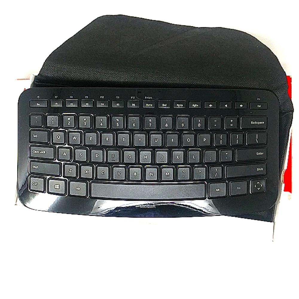 Microsoft Arc Wireless Keyboard Model: 1392 w/dongle Never Used